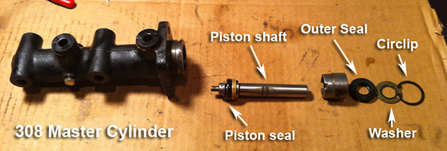 Disassembled 308 master cylinder